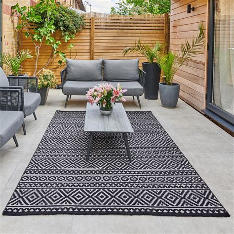 It can be placed on patios, porches, decks and camping. . Costco outdoor rug
